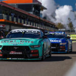 Courtney and Cameron in pits