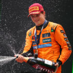 Piastri sprays champagne
