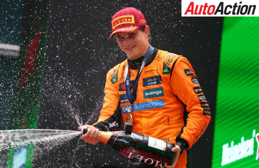 Piastri sprays champagne