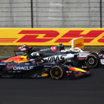 SHANGHAI, CHINA - MARCH 23: Oliver Bearman of Great Britain driving the (87) Haas F1 VF-25 Ferrari and Liam Lawson of New Zealand driving the (30) Oracle Red Bull Racing RB21 battle for track position during the F1 Grand Prix of China at Shanghai International Circuit on March 23, 2025 in Shanghai, China. (Photo by Clive Mason/Getty Images) // Getty Images / Red Bull Content Pool.