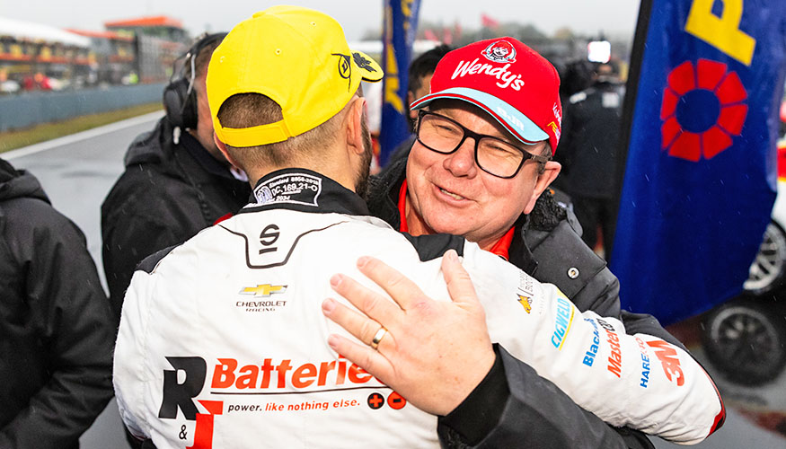Brad Jones hugs Andre Heimgartner at Taupo, NZ, in 2024 after the team's win.
