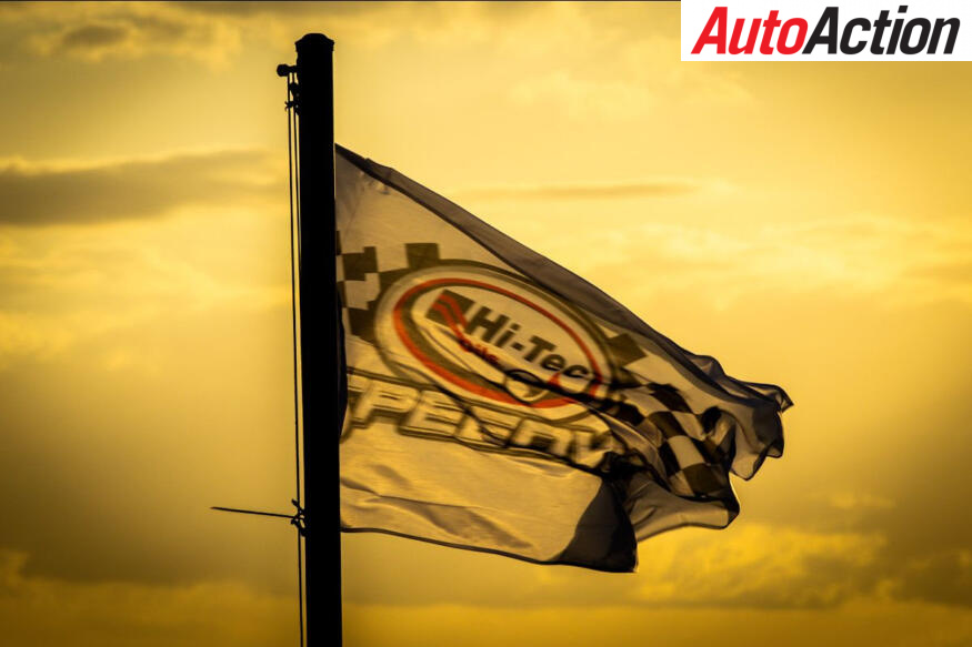 Sun sets behind the Toowoomba speedway flag